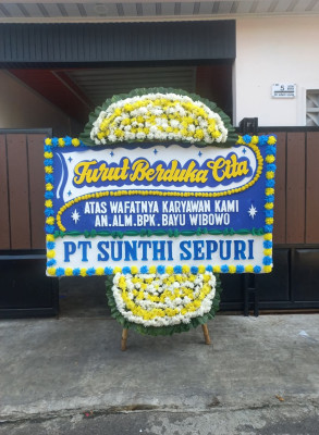 Papan Bunga Duka di Passi Barat