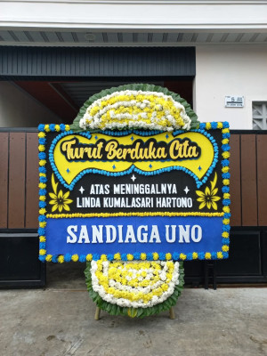 Papan Bunga Duka di Passi Barat